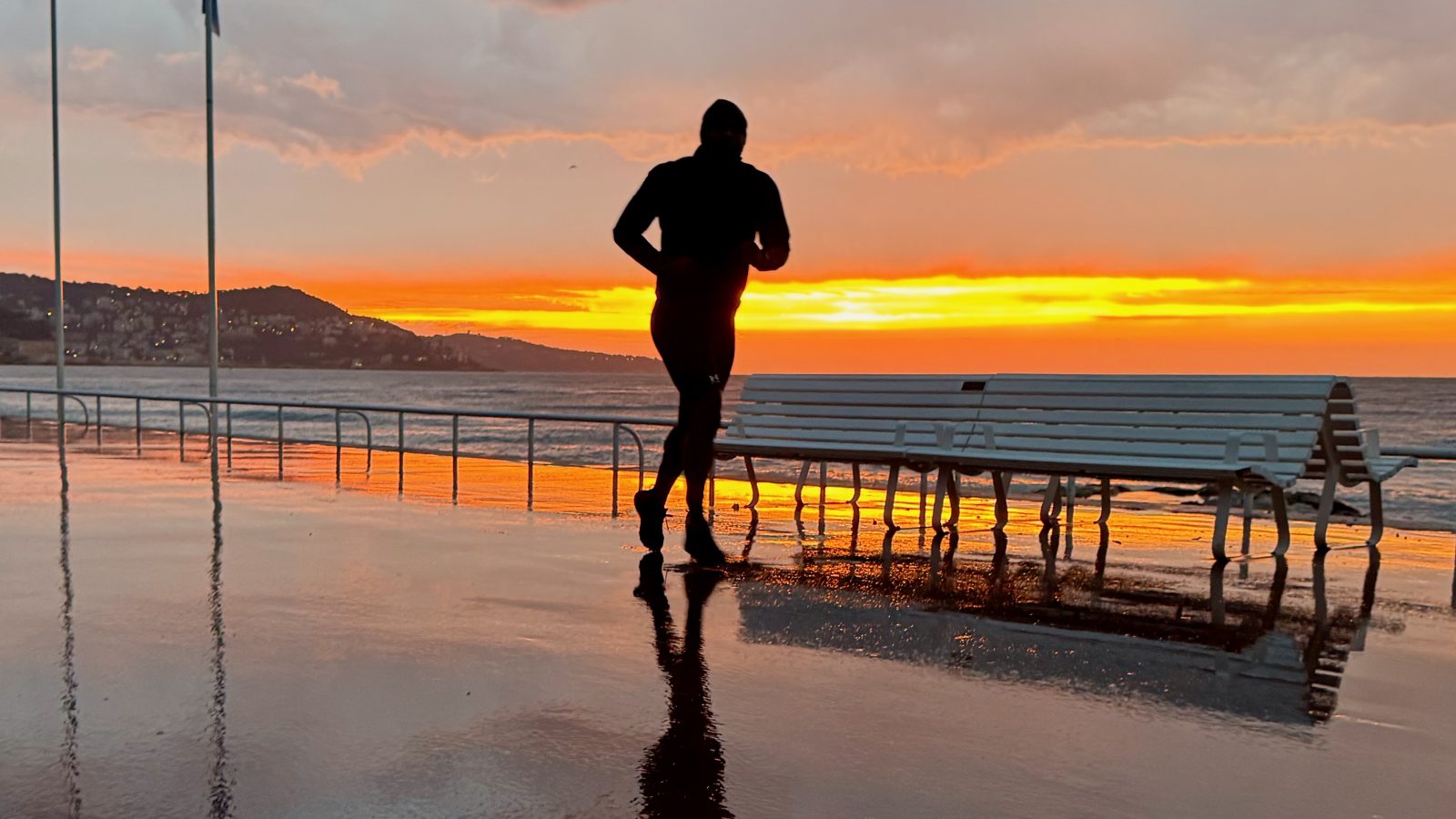 Runner at sunset on the Promenade des Anglais, Nice — French Riviera